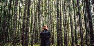woman standing in forest at cumberland