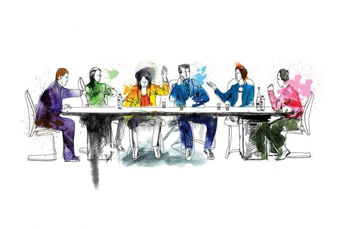 Silhouettes of successful business people working on meeting.