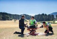 InDro Robotics CEO Philip Reece (left), together with an InDro pilot and technician, prep a drone flight to Penelakut Island.