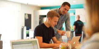 employees working at laptops