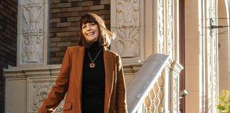 Photo of Sue Maitland on the steps of the Union Club in Victoria BC