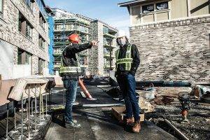 Ryan Hube (right), people and culture manager at Abstract Developments, on site with Abstract CEO Mike Miller.