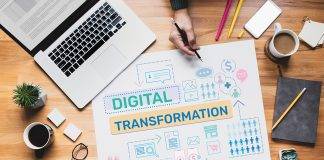laptop and spreadsheet working on digital transformation