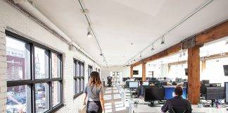 woman walking through an office