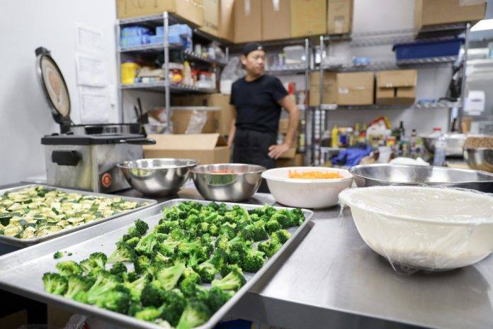 Photo of vegetables being prepared in a kitchen