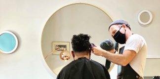Jamie McCallum cutting hair