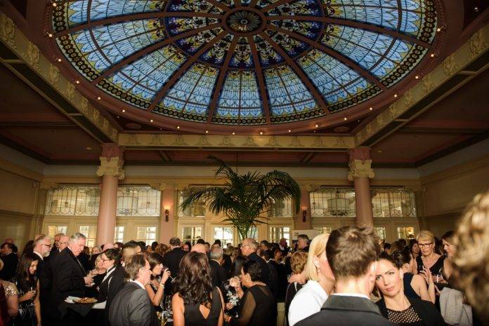 Guests mingle in the Crystal Ballroom of the Empress Hotel during a Victoria Chamber Business Awards event.