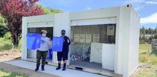volunteers at the Ditidaht Community School recycling facility.