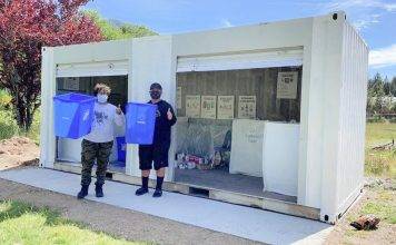 volunteers at the Ditidaht Community School recycling facility.