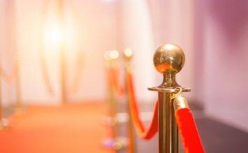 Red,Carpet,Between,Rope,Barriers,In,The,Party