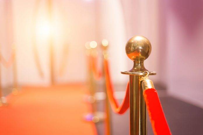 Red,Carpet,Between,Rope,Barriers,In,The,Party