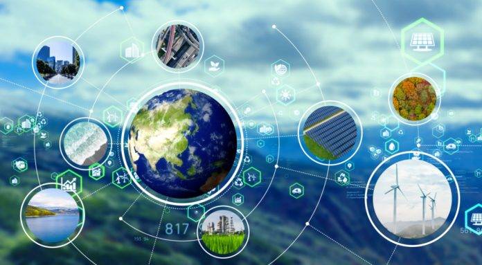 conceptual graphic of planet with green business industry icons