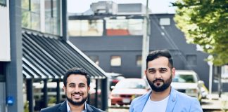 Rohit Boolchandani and Samarth Mod, founders of FreshWorks, outside their office building in downtown Victoria.