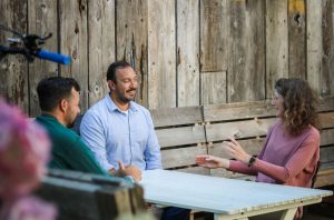 Luke Mari of Aryze, pictured here with his leadership team, was one of the driving forces behind Victoria's Tiny Homes Village. Photo: Eli Ramraj.