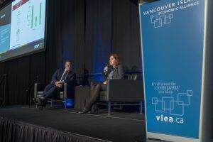 MNP Senior Economist Susan Mowbray, pictured with emcee and CHEK News anchor Joe Perkins, at the 2022 VIEA Economic Summit. 