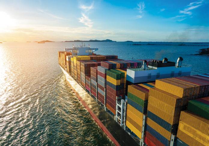 Aerial side view of cargo ship carrying container and running for export goods from cargo yard port to custom ocean concept technology transportation , customs clearance. Exporting 101 - Douglas Apr/May 2024