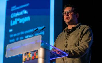 Jarid Taylor, owner of Brandigenous, speaks at Rising Economy 2024. Photo: James MacDonald.