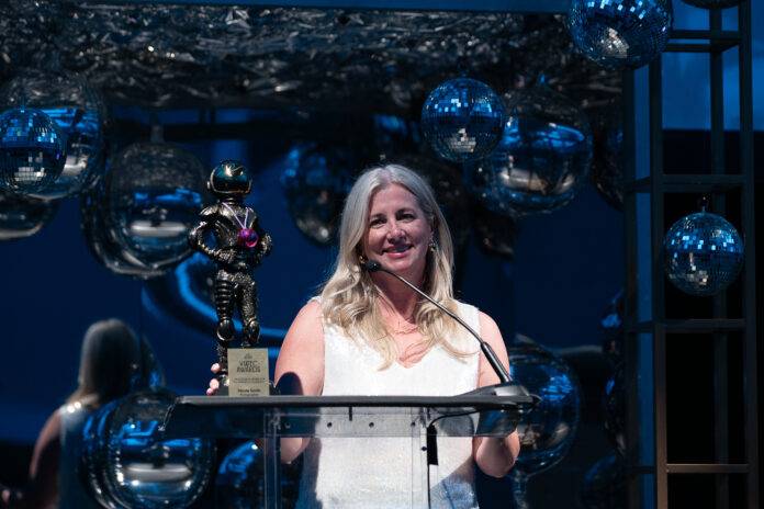 Viatec_Awards_2025-170 Flytographer founder & CEO Nicole Smith receives the Colin Lennox Award for Technology Champion at the 2025 VIATEC Awards. Photo: Trevor Ball.