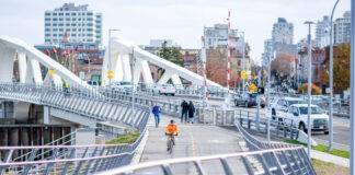 Douglas Weekly – September 24 Cyclist and pedestrians on the Johnson Street Bridge. Photo: victoriarising.ca/James MacDonald.