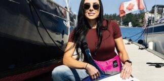 From Sails to Satchels Meaghan McDonald with Salt Legacy bags by the water.