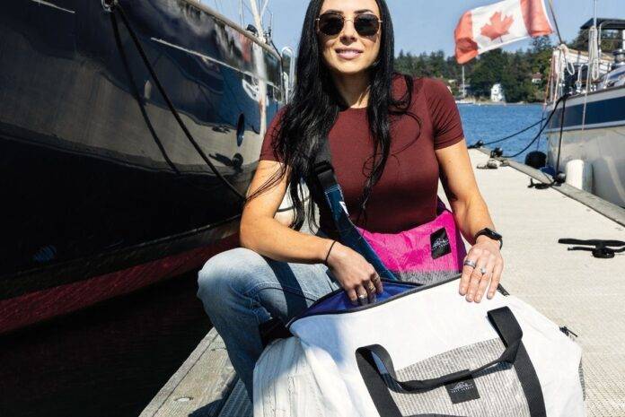 Canadian design brand Meaghan McDonald with Salt Legacy bags by the water.