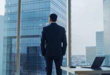 What Do You Value? Businessman gazing out window