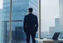 What Do You Value? Businessman gazing out window