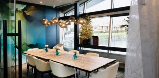 Small spaces, Big impact! Boom + Batten meeting room with waterfront view