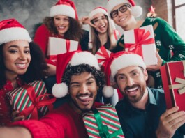 Douglas Holiday Gift Guide 2025 Group celebrating with Christmas gifts.