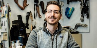 Michael Peirone working with prosthetic devices.