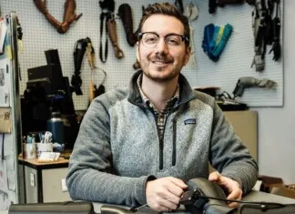 Michael Peirone working with prosthetic devices.