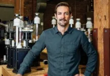 Scott Beatty with marine technology equipment background.