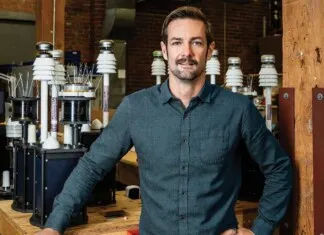 Scott Beatty with marine technology equipment background.