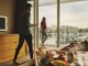 Couple enjoying a scenic hotel view of Victoria's Inner Harbour